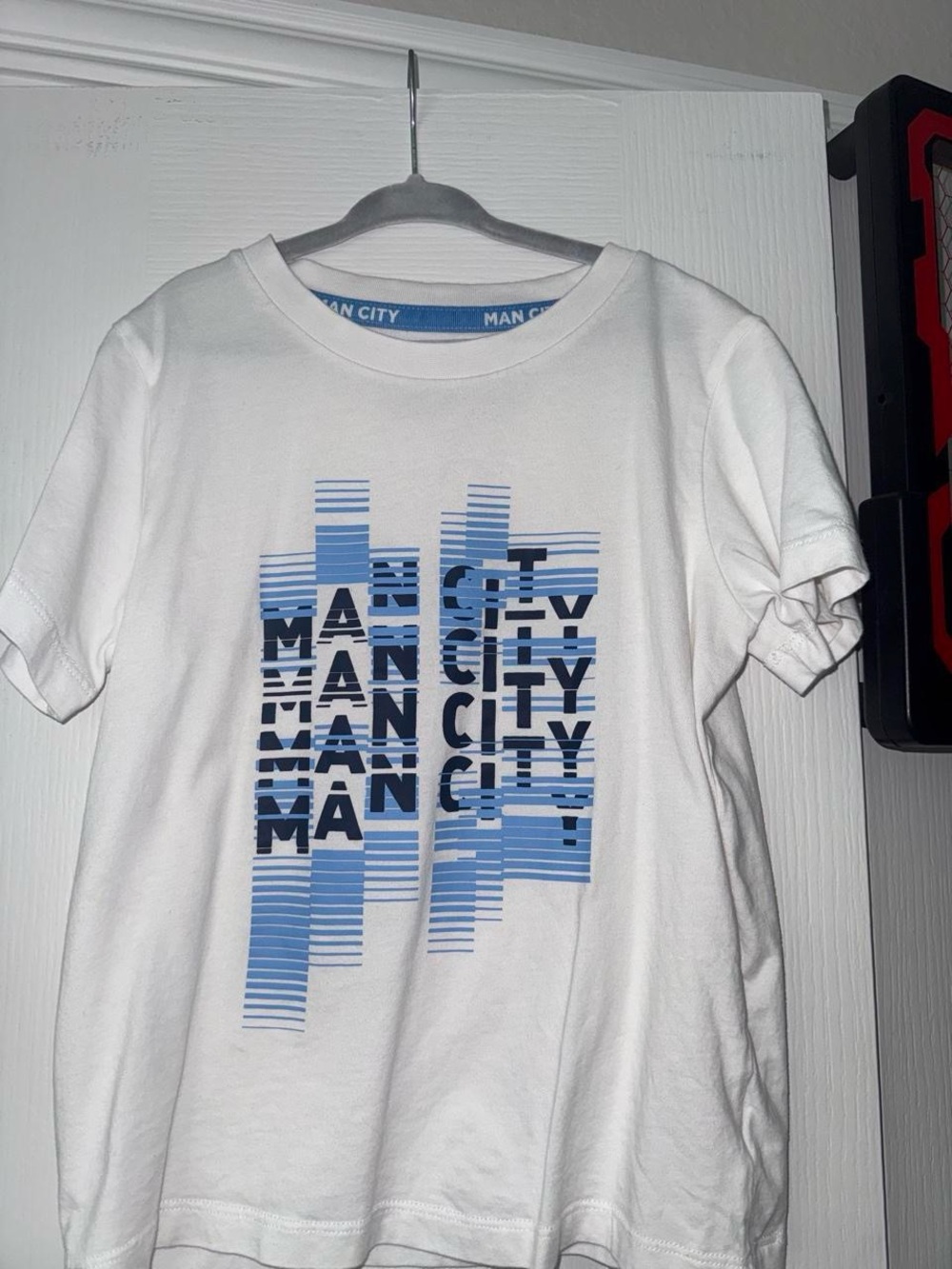 Man City White Short-Sleeve Tee with Blue Graphic